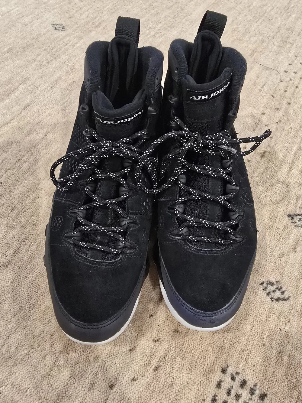 Air Jordan Black Suede High-Top Sneakers with Blue Accent